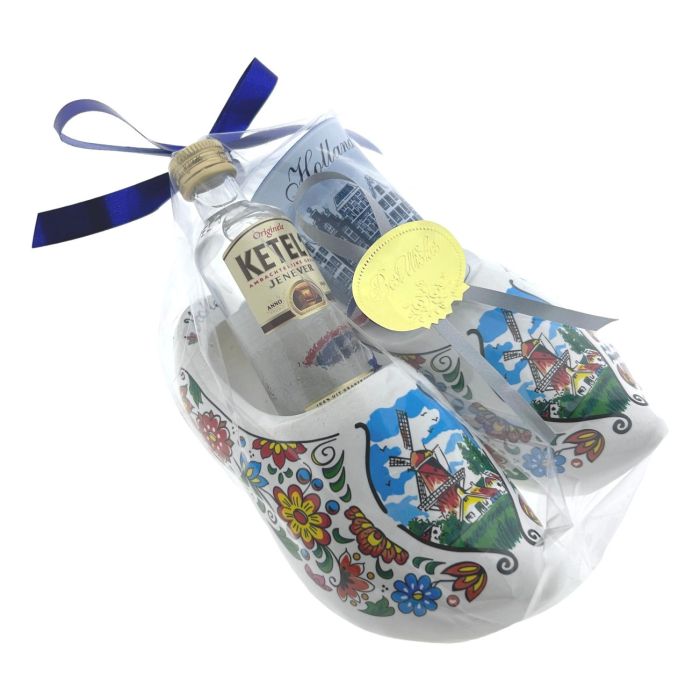 Wooden clogs with dutch gin in gift wrapping