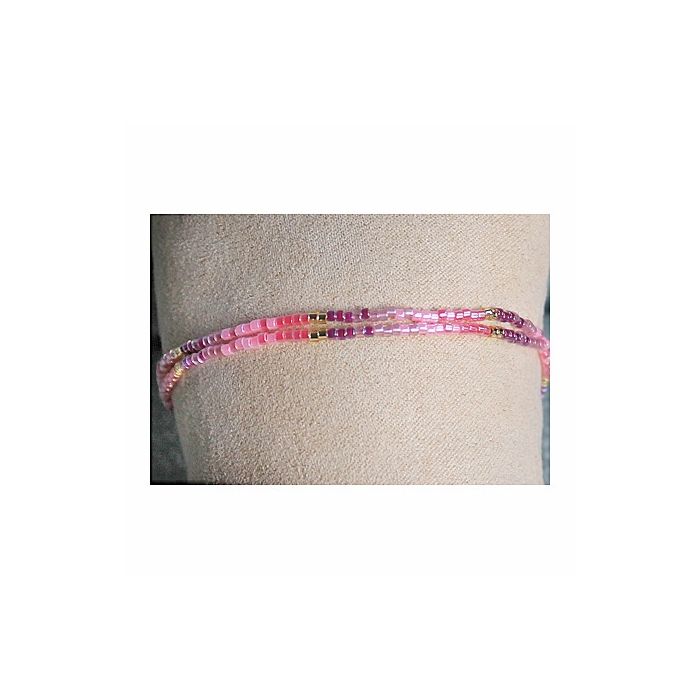 Dubbele 2mm Miyuki Delica armband in roze, lila, paars en goud kleuren. 