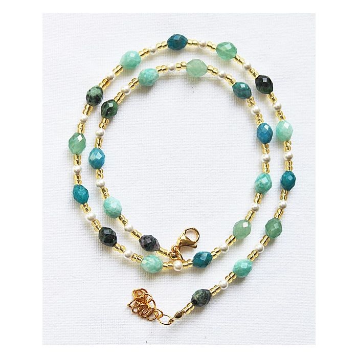 Ketting met verschillende facetgeslepen edelsteen kralen van 9x6mm.