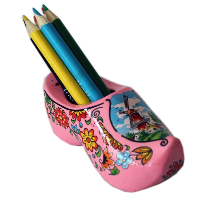 Pink clog with pencils and sharpener