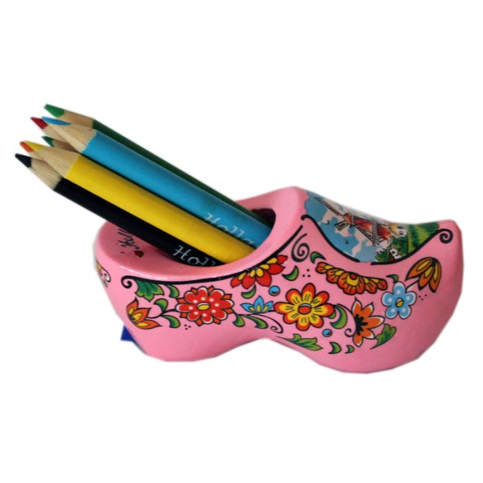 Pink clog with pencils and sharpener