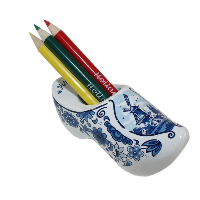 Clog with pencils and sharpener