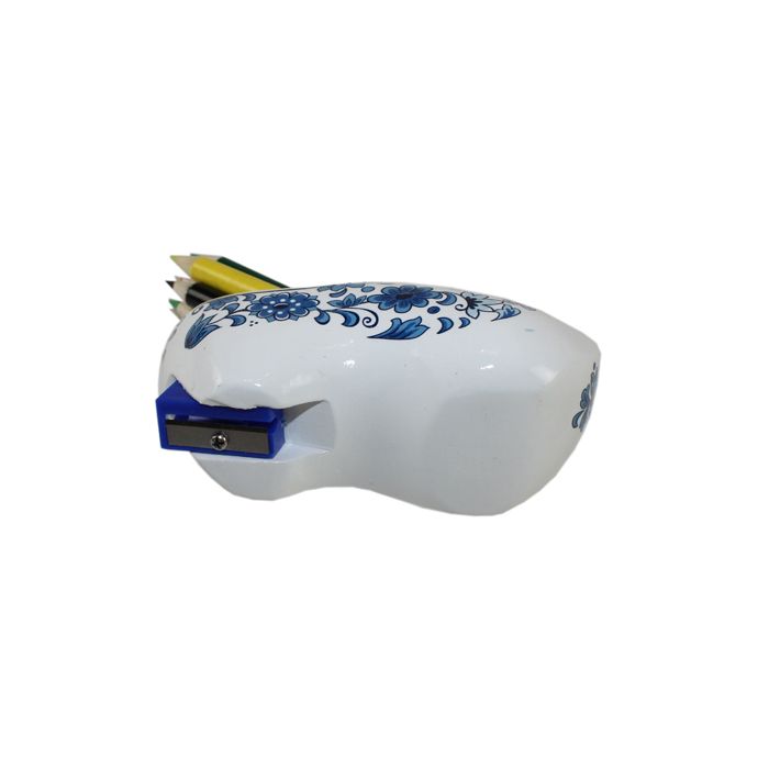 Clog with pencils and sharpener
