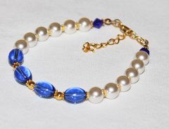 Armband matte glasparels en donkerblauwe glaskralen, 21cm.