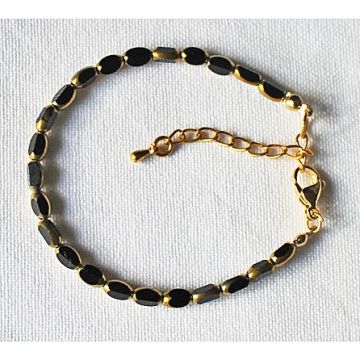 Armband zwarte kralen met goudkleurige rand