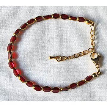Armband transparant wijnrode kralen met goudkleurige rand