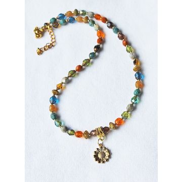 Ketting met facetgeslepen kralen en goldplated rvs hangertje