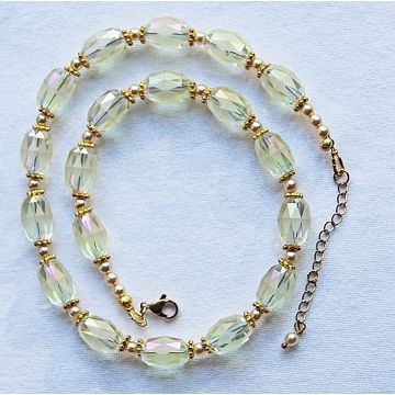 Ketting licht creme kleurige facetgeslepen 15x10mm kralen 