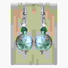 Kerst oorbellen, zilverkleurig met groen sneeuwvlokje