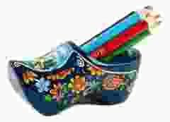 Klomp blauw met potloden en puntenslijper