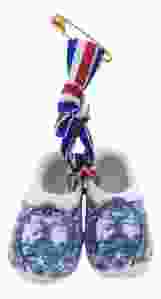 Corsage Klompje, Keramiek