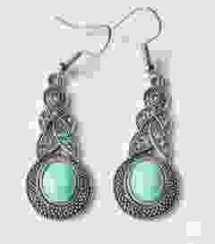 Lange turkoois oorbellen met strass steentjes