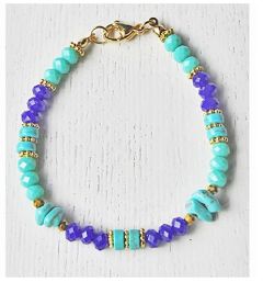 Armband donkerblauwe en groene facetgeslepen kralen