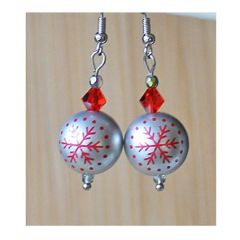 Kerst oorbellen, zilverkleurig met rood sneeuwvlokje
