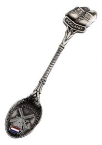 Teaspoon in box, two clogs