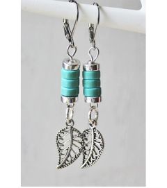 Oorbellen turkoois schijfjes en blaadje